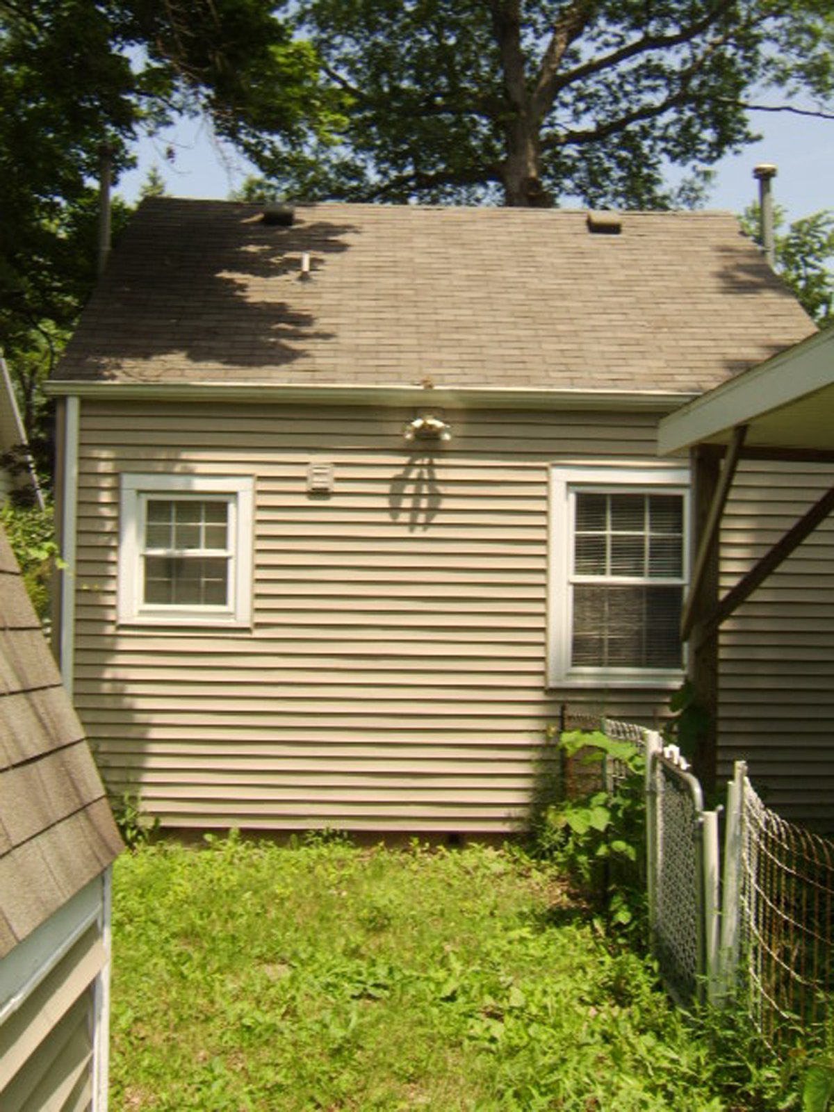 Property photo 1 - 1.5 Story Cape Cod Style Home