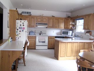 A prestigius and immaculate property on the SE edge of Bluffton sits on 5+/- partially wooded acres close to schools and state park.  Completely remodeled in 1992, the home draws you close to nature featuring two bay windows overlooking the scenic pond and beach, a large kitchen with sitting area opening to a patio overlooking the winding creek, a laundry room with new appliances and an island, a spacious master bedroom with full bath and a sitting area, a clean basement for play and storage, a heated and finished garage (fridge reserved), and a wrap porch to view the wildlife.  A main level 2nd full bath is plumbed.  A large outbuilding has a half-court gym, a rec room, large workshop areas, several finished rooms, and bathrooms.

There are two heat/AC units and a water softener.  The electric is metered separately from the house.   - Prestigious and Immaculate Property