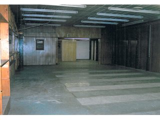 6.5 Acres including 13,176 sq. ft. commercial building in good condition.    Office area is 48' x 54', shop is 54' x 124'; and storage area is 54' x 72'.  

Office area is 2,592 sq. ft. with central air.  Natural gas heating.  Shop has floor drains and (2) overhead doors, used oil furnace, and large overhead hoist. - Commercial Building on 6.5 Acres