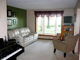 Beautiful 3 bedroom 2 bath home.  Includes attractive stone fireplace, open floor plan, newly remodeled bathroom, and custom hardwood kitchen cabinets.  All appliances stay other than (2) chest freezers in garage.  Over-sized garage.  

Wooded lot with beautiful landscaping.  Charming country setting in a great location.  Blacktop drive.   - Beautiful 3 Bedroom Home on Wooded Lot