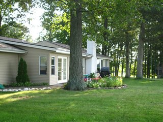 Beautiful 3 bedroom 2 bath home.  Includes attractive stone fireplace, open floor plan, newly remodeled bathroom, and custom hardwood kitchen cabinets.  All appliances stay other than (2) chest freezers in garage.  Over-sized garage.  

Wooded lot with beautiful landscaping.  Charming country setting in a great location.  Blacktop drive.   - Beautiful 3 Bedroom Home on Wooded Lot