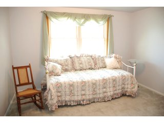 A very private setting with a unique view down the length of Shriner Lake.  Beautiful country setting with mature trees, great views of the lake from an elevated deck.  Road frontage on two sides!  Includes lovely orchard.  Great location close to Columbia City and Fort Wayne, - Lakefront Property on Shriner Lake