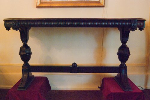 Antiqued Hall table. Natural Walnut. Ebonized tendon and legs. Dimensions 60 in. X 22 in. x 31 in. Height - Extraordinary Auction - Nike Spillson Home Interiors & Furnishings