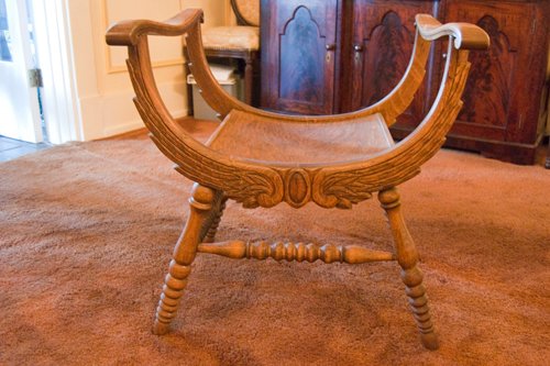 Oak saddle seat. Napoleonic chair with turned stretchers. Carved wood. 25.5 in. x 21.5 in. deep X 26.5 height - Extraordinary Auction - Nike Spillson Home Interiors & Furnishings