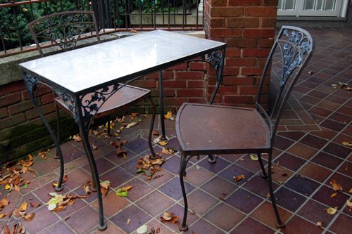 Woodard cast iron patio table 42 in. x 72 in. with 8 chairs. Plexiglas top. Two additional side tables. - Extraordinary Auction - Nike Spillson Home Interiors & Furnishings