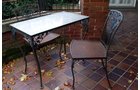 Woodard cast iron patio table 42 in. x 72 in. with 8 chairs. Plexiglas top. Two additional side tables. - Extraordinary Auction - Nike Spillson Home Interiors & Furnishings
