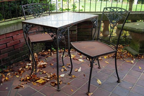 Woodard cast iron patio table 42 in. x 72 in. with 8 chairs. Plexiglas top. Two additional side tables. - Extraordinary Auction - Nike Spillson Home Interiors & Furnishings