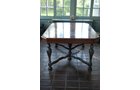 Walnut veneer dining room table. Ebonized legs. With 4 leaves. 45 in.W x 60 in. without leaves X 100 in. with all 4 leaves. Seats 6 to 12. - Extraordinary Auction - Nike Spillson Home Interiors & Furnishings