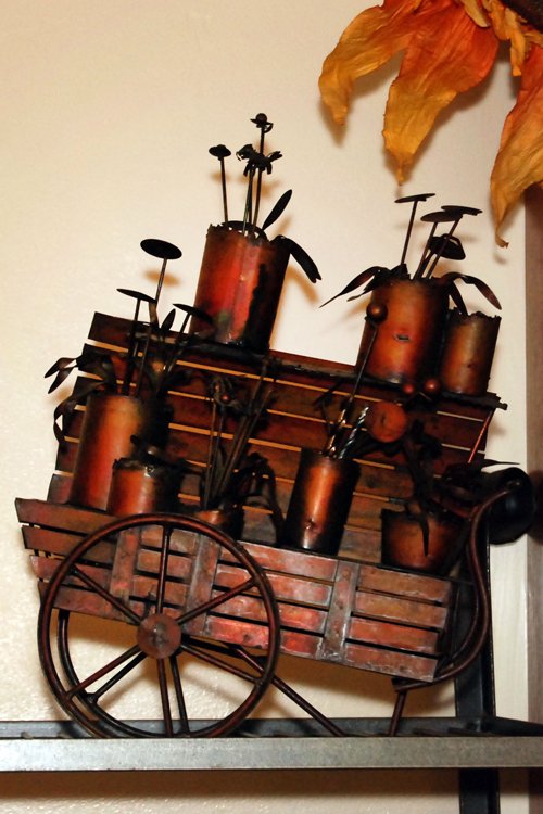 Metal flower wagon  - Extraordinary Auction - Nike Spillson Home Interiors & Furnishings
