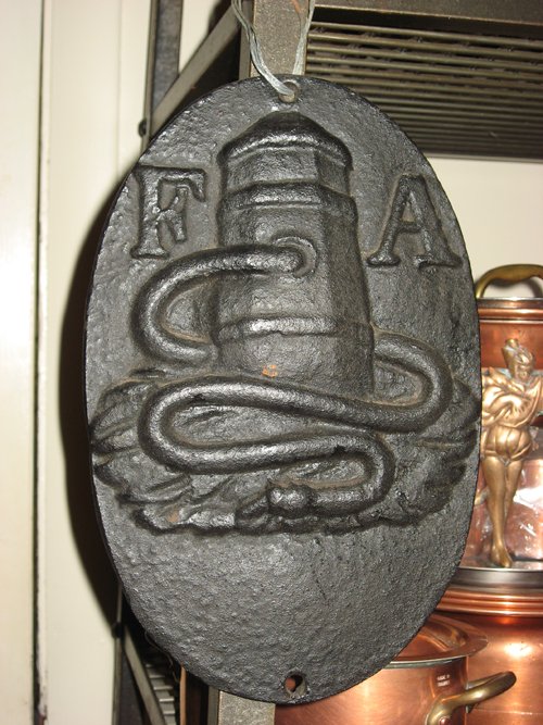 Antique iron fire mark  - Extraordinary Auction - Nike Spillson Home Interiors & Furnishings