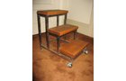 Late 1970s Dunbar step stool can double as end table. Chrome ball casters. - Extraordinary Auction - Nike Spillson Home Interiors & Furnishings