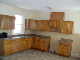 18.373 Acres (13 acres of productive cropland w/0.5 acres of CRP waterways).

- 3 Miles to I-70 exchange.
- 1800's Brick Federal home w/2700 SF.
- Stocked pond for family recreation.
- 1700 Ft. of road fronatage.
- A mix of woodland and tillable land. - 18.373 Acres with Country Home