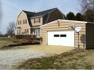 2961 Sq. Ft. 4 Bedroom, 2.5 bath home on 1.7 acres.  Forced air heat, central air, and attached 2-1/2 car garage.  

Built in 1930.  Total renovation in 1986.  Updated in 2006.  Beautiful country setting.  Adjacent to 14 acre private lake and park like setting with access. - Home with Beautiful Country Setting