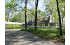 Property photo 1 - Real Estate Auction - 1939 Dutch Colonial home plus guest house, horse barn and 144 ft pole barn, all on over 11.5 acres