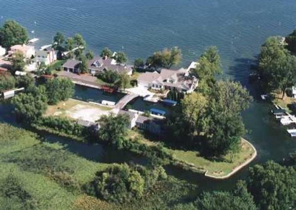2 Acres of Prime Lakefront Real Estate Auction with Home, Peninsula and Private Island