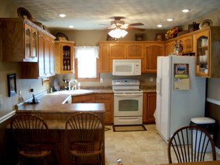Beautiful country home and 4.5+/- acres with barn, bins, and creek.  Additional 18 acres available.

Home w/4.5 Acres - $143,000
Additional 18 Acres - $7,000/Acre
Whole Property - $269,000

Possession:  At closing on home; subject to tenants rights on farmland. - Beautiful Country Home with Acreage