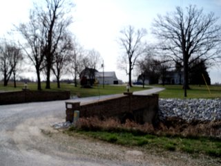 Beautiful country home and 4.5+/- acres with barn, bins, and creek.  Additional 18 acres available.

Home w/4.5 Acres - $143,000
Additional 18 Acres - $7,000/Acre
Whole Property - $269,000

Possession:  At closing on home; subject to tenants rights on farmland. - Beautiful Country Home with Acreage