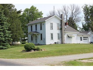 74 Acres with 2 homes and buildings.  Gently rolling land with 52+/- tillable acres and 18+/- wooded acres. - 74 Acres with 2 Homes & Buildings