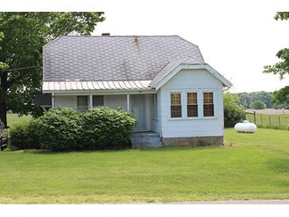 74 Acres with 2 homes and buildings.  Gently rolling land with 52+/- tillable acres and 18+/- wooded acres. - 74 Acres with 2 Homes & Buildings