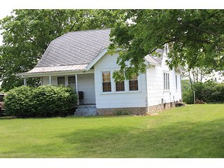 74 Acres with 2 homes and buildings.  Gently rolling land with 52+/- tillable acres and 18+/- wooded acres. - 74 Acres with 2 Homes & Buildings