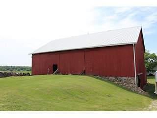 74 Acres with 2 homes and buildings.  Gently rolling land with 52+/- tillable acres and 18+/- wooded acres. - 74 Acres with 2 Homes & Buildings
