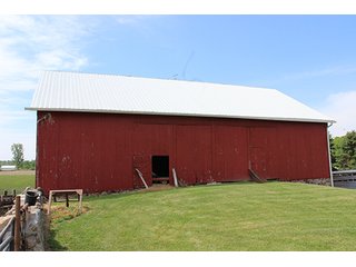 74 Acres with 2 homes and buildings.  Gently rolling land with 52+/- tillable acres and 18+/- wooded acres. - 74 Acres with 2 Homes & Buildings