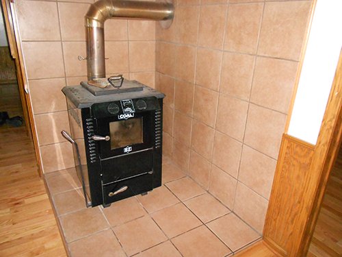 1 of 2 coal heating stoves - REAL ESTATE AUCTION-25 ACRES OFFERED IN 2 TRACTS IN NE ALLEN COUNTY