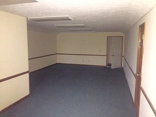 <b>Here is an opportunity to start a new business at a great location without all the costs of owning an individual property.  Excellent for any business that needs a drive-up or a vault, with plenty of parking space.</b><br><br>Built in 1992, this is the end unit of a condo office complex, which used to be a credit union and has a drive-up window.<br><br>Includes two 12x12 offices and a 9x9 vault.  The main floor is 1,510 sq. ft. and the second floor is 286 sq. ft. with an open area that includes a restroom.  Great for an office storage or conference room.  Slab foundation with wood and brick exterior.<br><br>Kendallville City Utilities, with central heat and air conditioning.<br><br>$167.00 takes care of outside maintenance, grass mowing, snow removal, etc. - Condo Office Complex