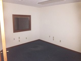 <b>Here is an opportunity to start a new business at a great location without all the costs of owning an individual property.  Excellent for any business that needs a drive-up or a vault, with plenty of parking space.</b><br><br>Built in 1992, this is the end unit of a condo office complex, which used to be a credit union and has a drive-up window.<br><br>Includes two 12x12 offices and a 9x9 vault.  The main floor is 1,510 sq. ft. and the second floor is 286 sq. ft. with an open area that includes a restroom.  Great for an office storage or conference room.  Slab foundation with wood and brick exterior.<br><br>Kendallville City Utilities, with central heat and air conditioning.<br><br>$167.00 takes care of outside maintenance, grass mowing, snow removal, etc. - Condo Office Complex