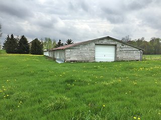 Mixture of tillable & wooded land including hog facility. - Hog Facility and Mixture of Tillable and Wooded Land