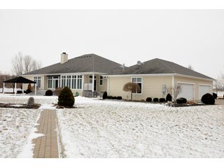 Copperstone Farms is a beautiful facility for horse-lovers, investors, and homeowners.  The grounds are impeccably groomed, the buildings are well-maintained, and the custom designed home is stunning in detail and layout.  The 5090 SF home has 10 rooms including 3 bedrooms, 2 full baths and 2 half baths, a large front porch an enormous great room with hardwood floors, gas fireplace and built-in entertainment center.  The master bedroom suite features a 21x23 bath with his and hers sinks, dressing areas, walk-in closets, large shower and jetted tub.  A private den opens off of the master bedroom and great room with a wall of built-in cabinets for work and storage.  The gourmet kitchen has an abundance of beautiful cabinets, custom features, cook tops, counter tops, breakfast bar and more.  The 4-car garage has custom flooring with ample closet and cabinet storage.  A 12 KW back-up generator provides power in the event of a power outage.

The 158 acres has about 100 acres tillable with about 70 acres that are well-tiled on 50' centers.  Yields a very productive Weighted Average Production Index of 148.  The acreage include about 10 wooded acres and a beautiful 6+/- acre pond to the rear of the home.  

A long private driveway leads to over 18 acres of groomed lawn, woods, pond, barns, and home.  Paver walkways bring you to the expansive front porch that features tiled floors and plenty of room for swings and outdoor furniture.   - SOLD 82.53+/- Acres  (Beautiful Facility for Horse-lovers, Investors and Homeowners)