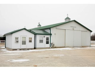 Copperstone Farms is a beautiful facility for horse-lovers, investors, and homeowners.  The grounds are impeccably groomed, the buildings are well-maintained, and the custom designed home is stunning in detail and layout.  The 5090 SF home has 10 rooms including 3 bedrooms, 2 full baths and 2 half baths, a large front porch an enormous great room with hardwood floors, gas fireplace and built-in entertainment center.  The master bedroom suite features a 21x23 bath with his and hers sinks, dressing areas, walk-in closets, large shower and jetted tub.  A private den opens off of the master bedroom and great room with a wall of built-in cabinets for work and storage.  The gourmet kitchen has an abundance of beautiful cabinets, custom features, cook tops, counter tops, breakfast bar and more.  The 4-car garage has custom flooring with ample closet and cabinet storage.  A 12 KW back-up generator provides power in the event of a power outage.

The 158 acres has about 100 acres tillable with about 70 acres that are well-tiled on 50' centers.  Yields a very productive Weighted Average Production Index of 148.  The acreage include about 10 wooded acres and a beautiful 6+/- acre pond to the rear of the home.  

A long private driveway leads to over 18 acres of groomed lawn, woods, pond, barns, and home.  Paver walkways bring you to the expansive front porch that features tiled floors and plenty of room for swings and outdoor furniture.   - SOLD 82.53+/- Acres  (Beautiful Facility for Horse-lovers, Investors and Homeowners)