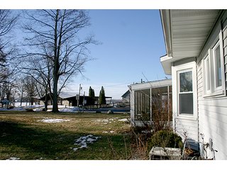 Great opportunity to buy a lovely, totally remodeled 2 bedroom 1541 sq. ft. home in Epworth Forest at Lake Webster.   Easement access to the lake with pier near the beachhouse.  Third bedroom and 1/2 bath over the garage. - Lovely, Totally Remodeled Home