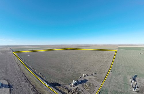 TRACT 1 - REAL ESTATE & MINERAL AUCTION - 640+/- ACRES & PRODUCING MINERALS OFFERED IN 8 TRACTS IN MORTON COUNTY, KANSAS