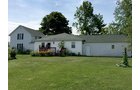Property photo 1 - REAL ESTATE AUCTION - 1.5 STORY COUNTRY HOME ON 1.76 ACRES IN NOBLE COUNTY, INDIANA
