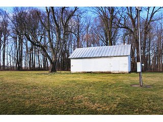 5 Acres includes 2 acres wooded, with bank barn and storage building. Excellent building site near Warsaw.  Great for children and/or animals.

Warsaw Madison Schools. - Building Site/Land with Woods