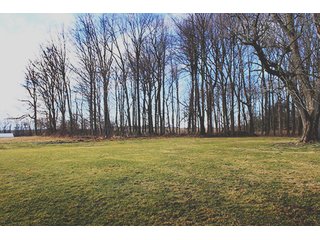 5 Acres includes 2 acres wooded, with bank barn and storage building. Excellent building site near Warsaw.  Great for children and/or animals.

Warsaw Madison Schools. - Building Site/Land with Woods