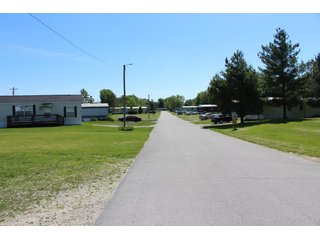 <b>Great Investment Opportunity.  Profitable Family Owned.</b>

40 Pad mobile home park located in the heart of the Orthopedic capital of the world.  

- Private Sewer & Water
- REMC Electric/NIPSCO natural gas/Comcast Cable
- The sewer system has 6 (2000 gal. tanks), with an estimated capacity of 28 GPM.  Each tank also has a leach field.
- Water system:  (2) wells - 4" and 6".
- Pad rent is $240 per month.
- Occupied Lots:  21 lots.
- <b>For financial information, contact the listing Agent.</b>

 - 40 Pad Mobile Home Park