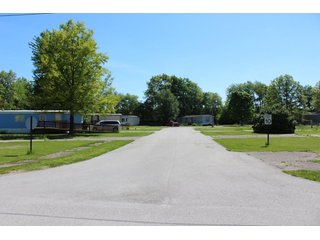<b>Great Investment Opportunity.  Profitable Family Owned.</b>

40 Pad mobile home park located in the heart of the Orthopedic capital of the world.  

- Private Sewer & Water
- REMC Electric/NIPSCO natural gas/Comcast Cable
- The sewer system has 6 (2000 gal. tanks), with an estimated capacity of 28 GPM.  Each tank also has a leach field.
- Water system:  (2) wells - 4" and 6".
- Pad rent is $240 per month.
- Occupied Lots:  21 lots.
- <b>For financial information, contact the listing Agent.</b>

 - 40 Pad Mobile Home Park