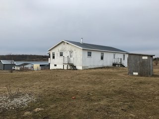 <b>40.65 Acres with 3 bedroom, one bath, 1500 sq. ft. home with full basement and pole barns.</b> 
 
Property is gently rolling and fully fenced.  

Don't miss this opportunity to buy this operating farm with good set of buildings.  Ready to go to work for you. - 40.65 Acres - Home & Pole Barns - Fully Fenced