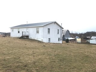 <b>40.65 Acres with 3 bedroom, one bath, 1500 sq. ft. home with full basement and pole barns.</b> 
 
Property is gently rolling and fully fenced.  

Don't miss this opportunity to buy this operating farm with good set of buildings.  Ready to go to work for you. - 40.65 Acres - Home & Pole Barns - Fully Fenced