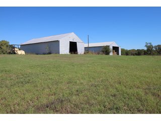 TRACT 1 - SIGNIFICANT LAND & PRODUCING MINERALS AUCTION - 237 +/- SURFACE ACRES IN 4 TRACTS - 18 MINERAL PACKAGES IN GARVIN, MCCLAIN, GRADY & ROGER MILLS COUNTIES, OK - 6 Mo. AVG. CASH FLOW of $196,376/Mo.