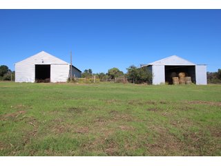 TRACT 1 - SIGNIFICANT LAND & PRODUCING MINERALS AUCTION - 237 +/- SURFACE ACRES IN 4 TRACTS - 18 MINERAL PACKAGES IN GARVIN, MCCLAIN, GRADY & ROGER MILLS COUNTIES, OK - 6 Mo. AVG. CASH FLOW of $196,376/Mo.