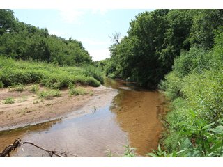 TRACT 3 - SIGNIFICANT LAND & PRODUCING MINERALS AUCTION - 237 +/- SURFACE ACRES IN 4 TRACTS - 18 MINERAL PACKAGES IN GARVIN, MCCLAIN, GRADY & ROGER MILLS COUNTIES, OK - 6 Mo. AVG. CASH FLOW of $196,376/Mo.