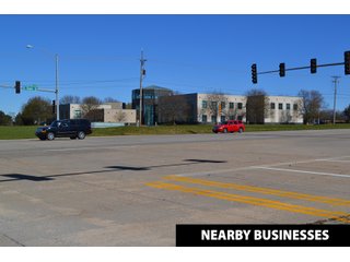 NEARBY BUSINESSES - ABSOLUTE REAL ESTATE AUCTION - 64.59+/- ACRES OFFERED IN 25 TRACTS IN ROCKFORD, WINNEBAGO COUNTY, ILLINOIS. - 7 Commercial Lots - 16 Residential Lots - 43.9+/- Acres of Unplatted Land (2 Tracts)