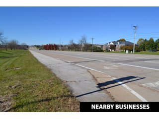 NEARBY BUSINESSES - ABSOLUTE REAL ESTATE AUCTION - 64.59+/- ACRES OFFERED IN 25 TRACTS IN ROCKFORD, WINNEBAGO COUNTY, ILLINOIS. - 7 Commercial Lots - 16 Residential Lots - 43.9+/- Acres of Unplatted Land (2 Tracts)