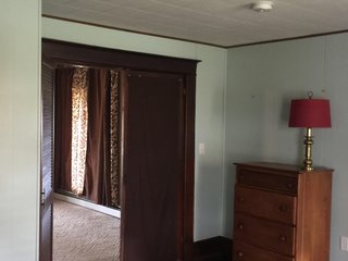 <b>OPEN HOUSE: Thursday December 12, 2 -4 pm</b>
Country living at its best.  This 1,751 sq. ft. home with 3 bedrooms and 2 full baths sits on a beautiful setting of 2.5 acres; open fields and woods are nearby for a view that is indescribable.  The home has a front and side porch with a swing, propane fired hot water heat, separate bedrooms, mud room, vinyl siding, attached 1 car garage and a basement.

<b>1,751 sq, ft. older home on 2.5 Acres
3 bdrm, 2 bath 
Hot Water Heat 
Vinyl Siding
3 Out Buildings.
Attached 1 Car Garage</b> - REAL ESTATE FOR SALE - 1,751 SQ. FT. HOME ON 2.5 ACRES