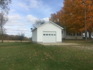 <b>OPEN HOUSE: Thursday December 12, 2 -4 pm</b>
Country living at its best.  This 1,751 sq. ft. home with 3 bedrooms and 2 full baths sits on a beautiful setting of 2.5 acres; open fields and woods are nearby for a view that is indescribable.  The home has a front and side porch with a swing, propane fired hot water heat, separate bedrooms, mud room, vinyl siding, attached 1 car garage and a basement.

<b>1,751 sq, ft. older home on 2.5 Acres
3 bdrm, 2 bath 
Hot Water Heat 
Vinyl Siding
3 Out Buildings.
Attached 1 Car Garage</b> - REAL ESTATE FOR SALE - 1,751 SQ. FT. HOME ON 2.5 ACRES