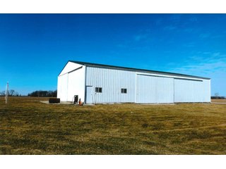 <b>HOUSE, ATTACHED GARAGE & 3+/- ACRES</b>
- <b>Size:</b>  3 Acres
- <b>Frontage:</b>  CR 1000 N         
- <b>Zoning:</b>  100-Ag            
- <b>Year Built:</b>  2012-2013
- <b>Style:</b>  1.5 Story Cape Cod
- <b>Size:</b>  2818 Sq. Ft.
- <b>Basement:</b>  1836 Sq. Ft.
- <b>Bedrooms:</b>  3
- <b>Baths:</b>  3.5       
- <b>Rooms:</b>  5
- <b>Fireplace:</b>  Yes
- <b>Front Porch:</b>  9'x42'
- <b>Back Porch:</b>  11'x42'
- <b>Electric:</b>  200 Amp
- <b>Phase:</b>  1st        
- <b>Air:</b>  Central
- <b>Heat:</b>  LP Gas
- <b>Siding:</b>  Cement Board
- <b>Roof:</b>  Asphalt
<br>       
- <b>Breezeway between house and garage</b>
- <b>Garage:</b>  30' x 36'
- <b>Bath:</b>  Full bath & shower
- <b>Kitchen:</b>  Summer
- <b>Siding:</b>  Cement Board
- <b>Roof:</b>  Asphalt

<b>11.929+/- ACRES, BUILDINGS & PASTURELAND</b>

There is an additional 11.929 acres around the home with tool shed, (2) grain bins, and (2) cattle sheds.  Property has a small creek and pasture land with some fencing.  Frontage on CR 1000 N & 600 W. - Cape Cod Rural Farm Home & Land