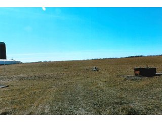 <b>HOUSE, ATTACHED GARAGE & 3+/- ACRES</b>
- <b>Size:</b>  3 Acres
- <b>Frontage:</b>  CR 1000 N         
- <b>Zoning:</b>  100-Ag            
- <b>Year Built:</b>  2012-2013
- <b>Style:</b>  1.5 Story Cape Cod
- <b>Size:</b>  2818 Sq. Ft.
- <b>Basement:</b>  1836 Sq. Ft.
- <b>Bedrooms:</b>  3
- <b>Baths:</b>  3.5       
- <b>Rooms:</b>  5
- <b>Fireplace:</b>  Yes
- <b>Front Porch:</b>  9'x42'
- <b>Back Porch:</b>  11'x42'
- <b>Electric:</b>  200 Amp
- <b>Phase:</b>  1st        
- <b>Air:</b>  Central
- <b>Heat:</b>  LP Gas
- <b>Siding:</b>  Cement Board
- <b>Roof:</b>  Asphalt
<br>       
- <b>Breezeway between house and garage</b>
- <b>Garage:</b>  30' x 36'
- <b>Bath:</b>  Full bath & shower
- <b>Kitchen:</b>  Summer
- <b>Siding:</b>  Cement Board
- <b>Roof:</b>  Asphalt

<b>11.929+/- ACRES, BUILDINGS & PASTURELAND</b>

There is an additional 11.929 acres around the home with tool shed, (2) grain bins, and (2) cattle sheds.  Property has a small creek and pasture land with some fencing.  Frontage on CR 1000 N & 600 W. - Cape Cod Rural Farm Home & Land